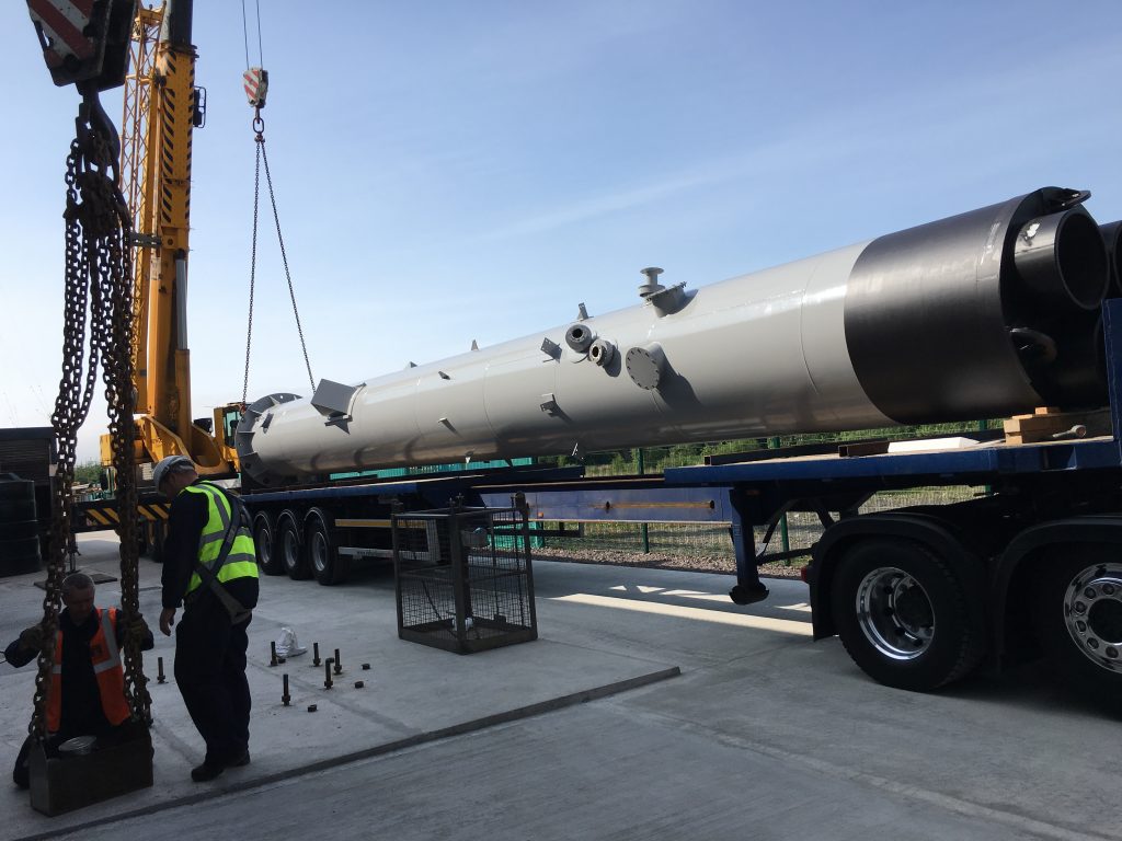 Filter system being unloaded from a lorry